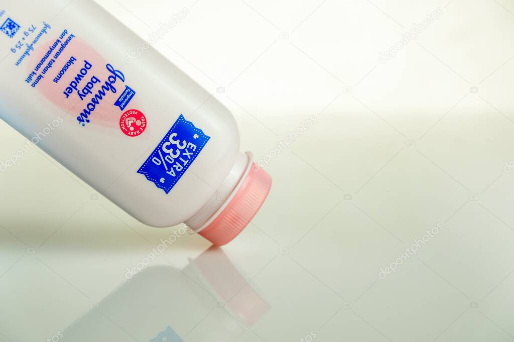 Kuala Lumpur Malaysia-Nov 6 2019: Isolated white bottle of Johnson's baby powder on table. Focus on text Johnson's at bottle. Recently the product has been recalled due asbestos concern by US FDA.