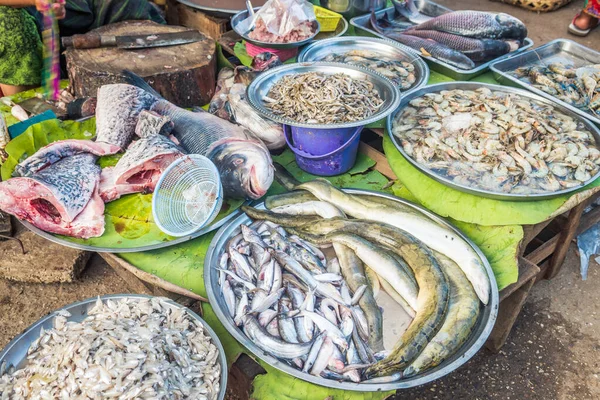 fresh fish is selling at yangon streets, myanmar