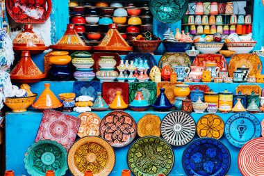 colorful pottery at moroccan shop clipart