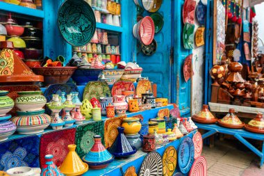 colorful pottery at moroccan shop clipart