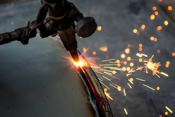 fire metal cutting at construction site