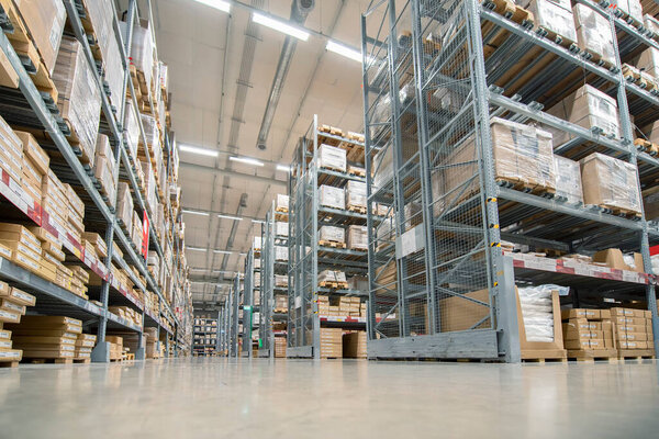 Huge distribution warehouse with high shelves
