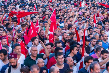 15 Temmuz 2019 İstanbul / Türkiye 15 Temmuz mitingine ellerinde Türk bayraklarıyla gidenler.