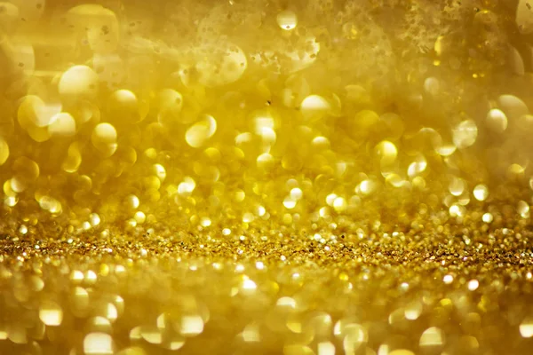 Gouden glitter textuur abstracte achtergrond. — Stockfoto