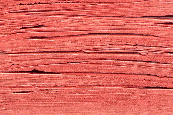 Primer plano crema lápiz labial textura fondo — Foto de Stock