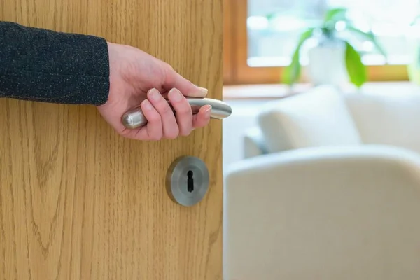 Woman Opening Door Cozy Home Interior — Stock Photo, Image