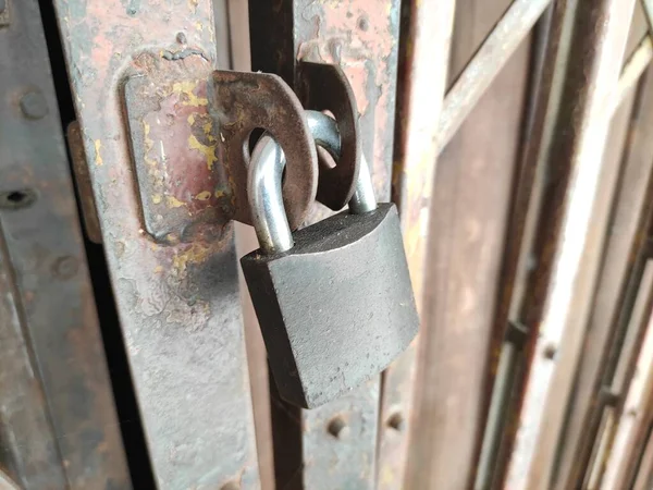 A lock is a mechanical or electronic fastening device that is released by a physical object by supplying secret information  or by a combination thereof or only being able to be opened from one side such as a door chain.