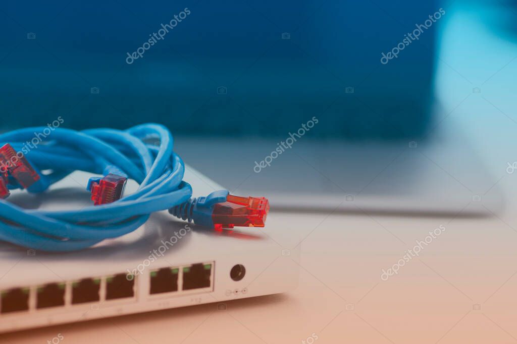 Enterprise equipment concept. Black and silver  cloud switches interconnected using bright cables on the white background. Rack mount routers. Space for your text. Closeup.