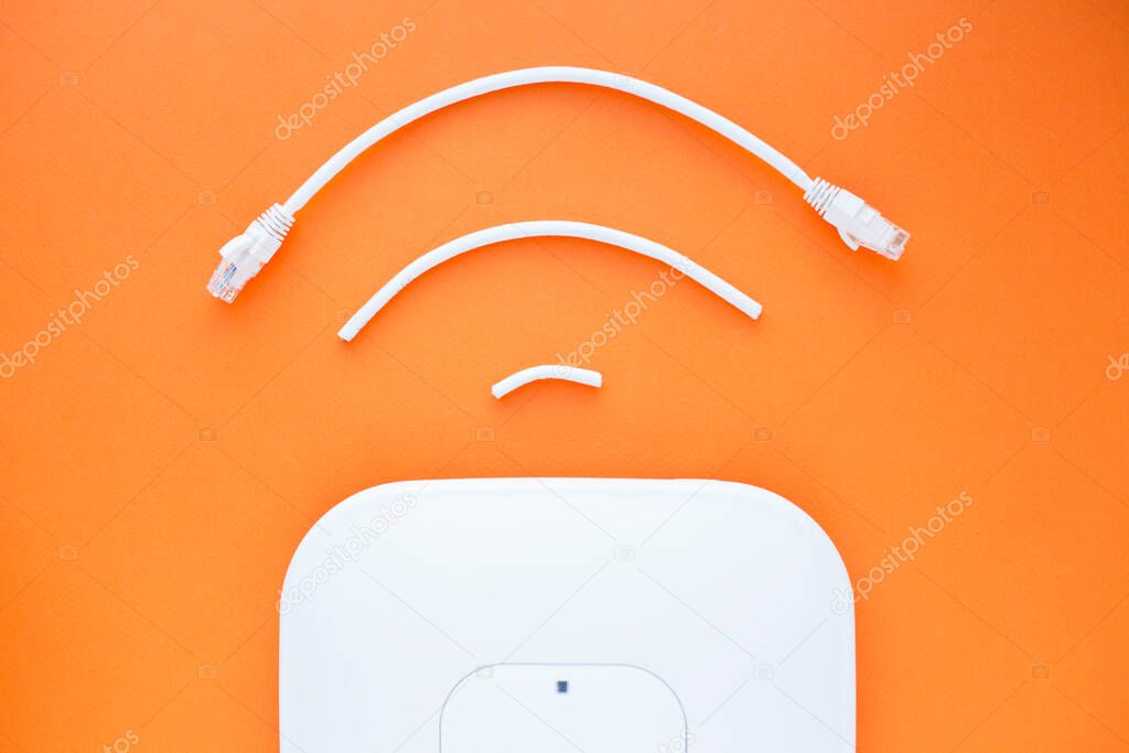 Corporate network concept. Wireless(wi-fi) icon. Access points (APs) on the orange background. Top view. Space for a text. Close up.