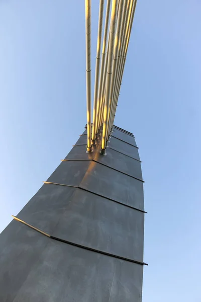 Industrial. Close-up of a fragment of the cable-stayed bridge pylon in the place where the cables are fastened. Bottom of the pylon (Betancourt bridge)