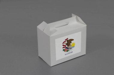 Mavi arka planda beyaz kutuda Illinois bayrağı. Illinois 'den ihracat ticareti kavramı, kağıt ambalajlama..