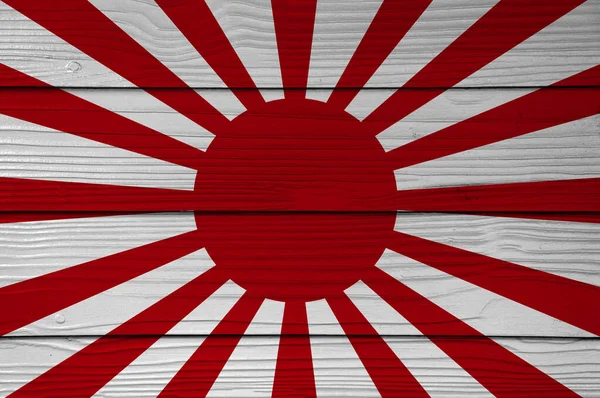 Japon İmparatorluk Ordusu 'nun savaş bayrağı Fiber çimento duvar arkaplanına boyanmış. Yükselen Güneş Bayrağı.