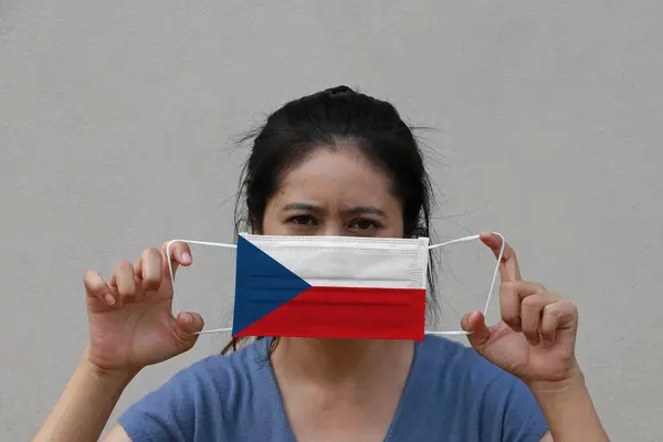 Woman Czech Republic Flag Hygienic Mask Her Hand Lifted Front — Stock Photo, Image