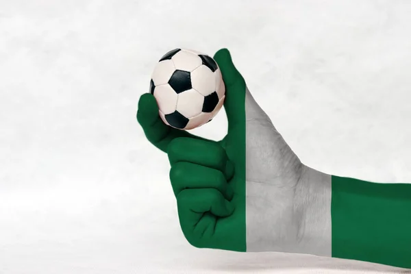 Mini Ball Football Nigeria Flag Painted Hand Hold Two Finger — Stock Photo, Image