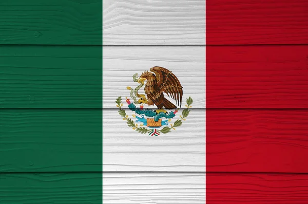 Mexico flag color painted on Fiber cement sheet wall background, a vertical tricolor of green white and red with the nation Coat of Arms centered on white.