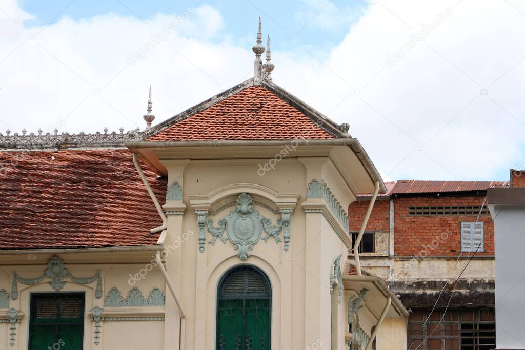 Old local vintage building house of the heritage colonial architecture in Phnom Penh, Cambodia.