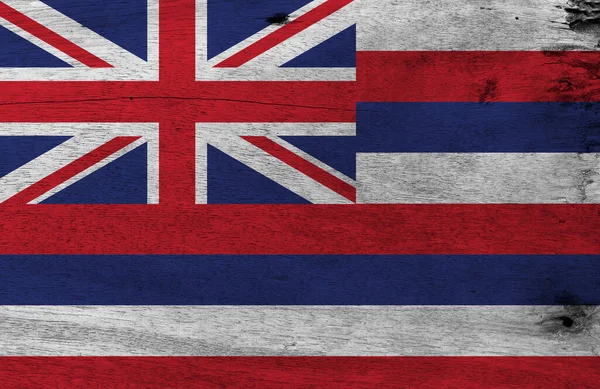 Flag of Hawaii on wooden plate background. Grunge Hawaii flag texture, The states of America. Eight stripes of white red and blue with a Union flag.