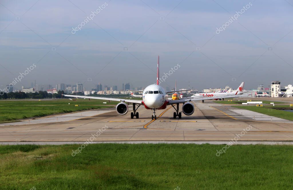 Don muang, Bangkok, Thailand, June 6, 2018 : Airbus A320 neo of of Thai Airasia, Boeing 737-8AS, of Nokair, plane of Thai Lion Air and other airlines run in a row on the runway to prepare for flight.