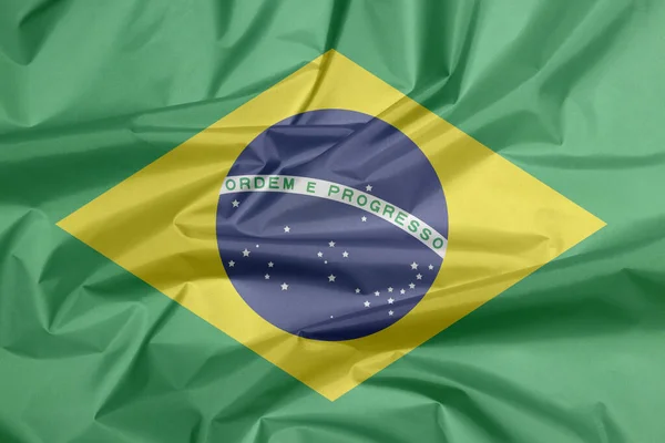 Stofffahne Von Brasilien Falte Der Brasilianischen Flagge Hintergrund Grün Gelb — Stockfoto