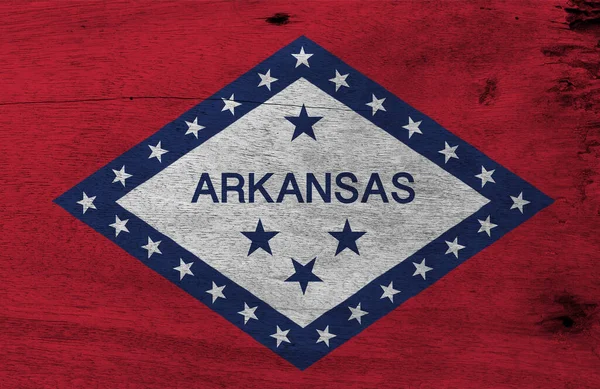 Arkansas bayrağı ahşap arka planda. Grunge Arkansas bayrak dokusu, Amerika devletleri.