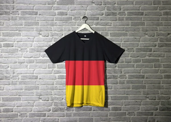 Germany Flag Shirt Hanging Wall Brick Pattern Wallpaper Black Red — Stock Photo, Image