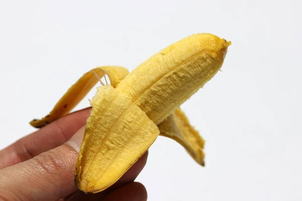 Banană Pisang Mas Decojită Mână Izolată Fundalul Alb Banane Aurii — Fotografie, imagine de stoc