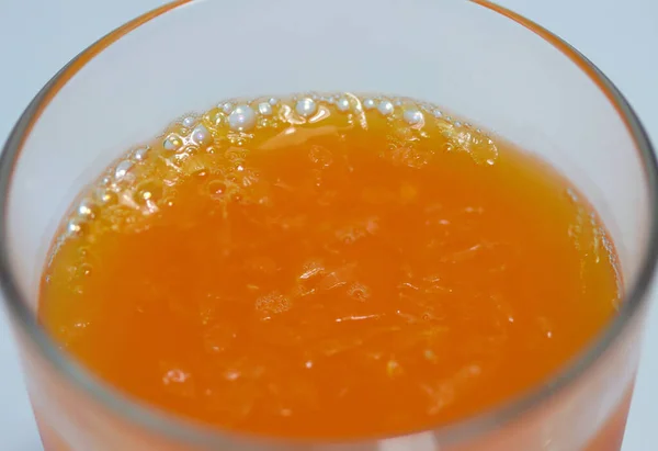 Cierre Jugo Naranja Vaso Vaso Jugo Líquido Obtenido Naranja — Foto de Stock