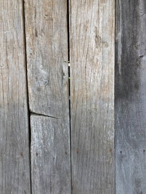 Gri-kahverengi dikey tahta panel deseni.