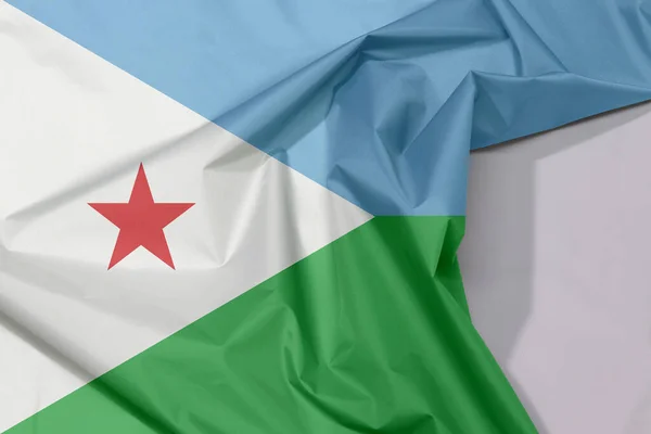 Djibouti Stoffen Vlag Crêpe Vouw Met Witte Ruimte Een Horizontale — Stockfoto