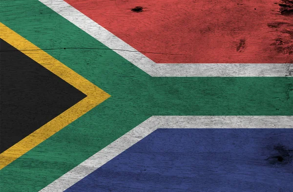 木製のプレートの背景に南アフリカの旗 三角形に対して黒の三角形 白と緑の水平Yと金で南アフリカの旗のテクスチャ 赤と青を接ぎ木 — ストック写真