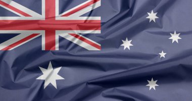 Avustralya 'nın kumaş bayrağı. Avustralya bayrak arkaplan kırışıklığı, beyaz yıldız ve Union Jack ile mavi ve beyaz renk.