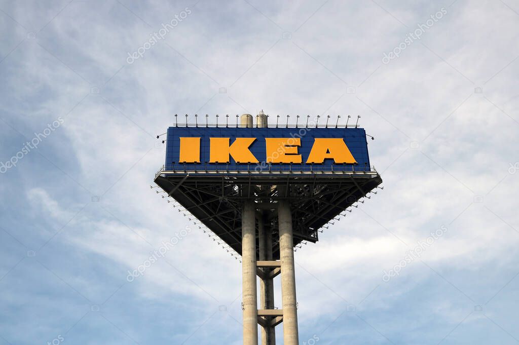 Bang Phli, Samut Prakan, Thailand, Jan 7, 2018 : High triangle sign of yellow and blue color IKEA in front of IKEA Store. IKEA is a Big furniture retailer and sells furniture, appliances and home accessories.