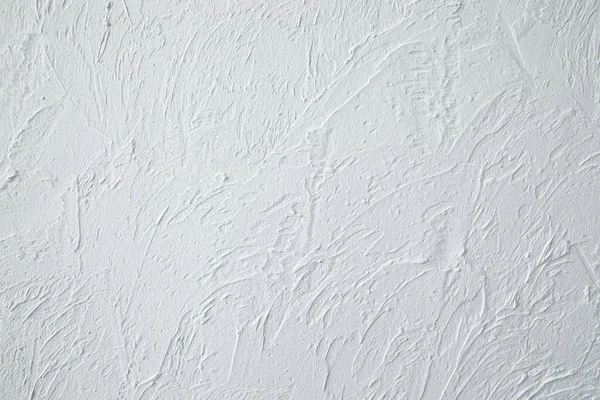 ざらざらした漆喰白壁の背景の抽象的な質感 — ストック写真