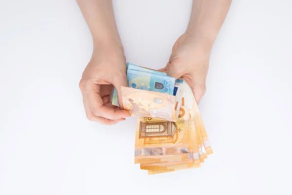Mãos Femininas Contando Notas Euros Isoladas Sobre Fundo Branco Vista — Fotografia de Stock