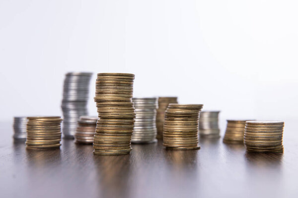 collection of colorful metal coins isolated on white background, close view  