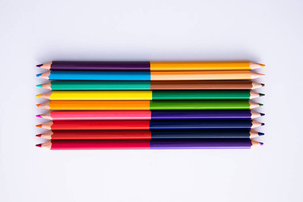collection of wooden colorful pencils isolated on white background, close view 