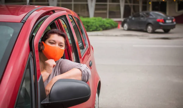 Social distance concept. Life people after quarantine. Middle aged plus size lady wear protective mask at street