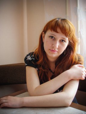 A simple ordinary average girl graduate from an American school high school graduation in the park. Young woman who have a dream. Snapshot with a fashionable vintage effect