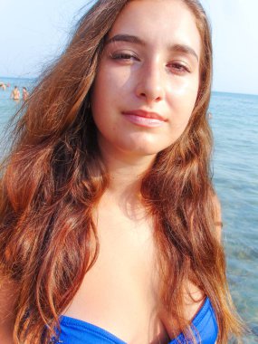 No retouch beauty, body positive. Young simple plus size indian girl in swimwear enjoying vacation, woman with xl figure, pretty girl, vintage texture