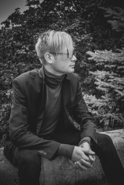 Handsome guy walking around, Student at city street, college or university lifestyle time 