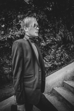 Handsome guy walking around, Student at city street, college or university lifestyle time 