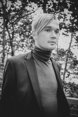 Handsome guy walking around, Student at city street, college or university lifestyle time 