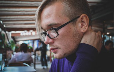 Handsome guy in cafe, Student at city street, college or university lifestyle time 