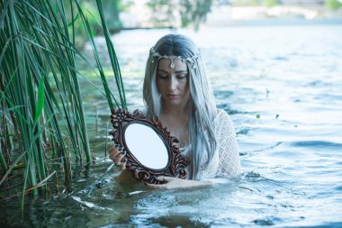 Old European magic, Mystical Pagan scene, woman in lake, rituals. Magic divination in water, ritual. Psychic vision, fortune teller clipart