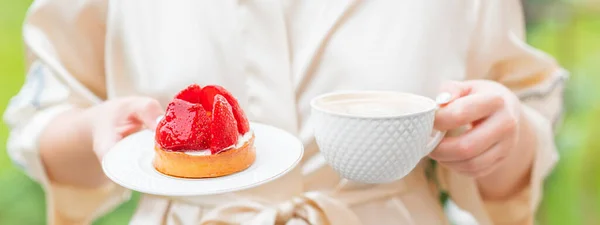 Sweet morning, cake with fruits and cup of coffee