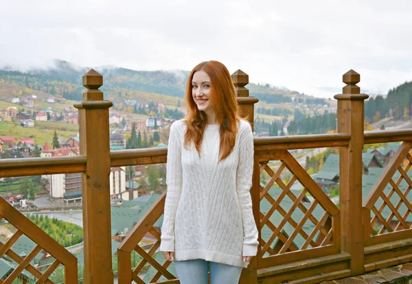 Young woman in trip, vacation at autumn time. Beautiful view at vacation. European holidays time , landscape