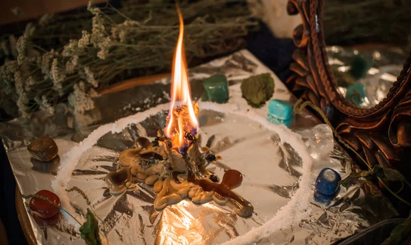 Candle for cleansing a person, magic rituals and wax casting, energy cleansing. Altar of modern witch.