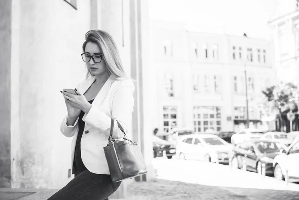 Woman at city, business woman style, fashionable outfit for work. Concept of modern lady lifestyle