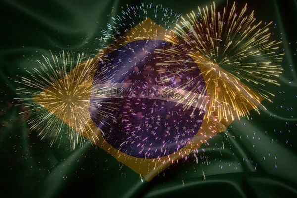 Havai fişek arka planında renkli Brezilya bayrağı sallıyor.