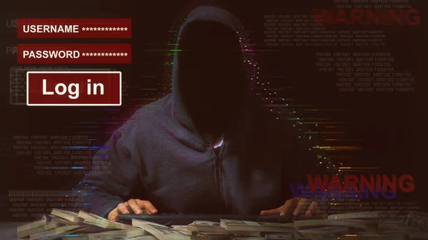 Tanımlanamayan bir kapüşonlu hackerla siber saldırı. Kapüşonlu adam bilgisayar korsanı. Bilgisayar güvenliği kavramı